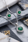 The Radiant Emerald Solitaire Set