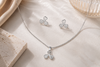 The Shimmering Clover Pendant & Earring Set