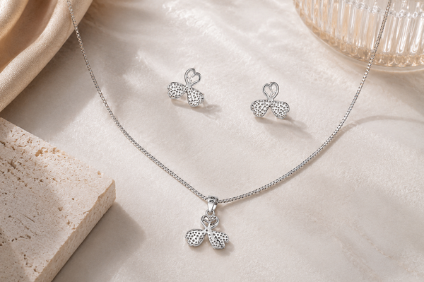 The Shimmering Clover Pendant & Earring Set