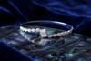 The Elara Emerald-Cut Halo Bangle