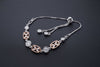 The Aurora Mixed-Metal Blossom Bolo Bracelet
